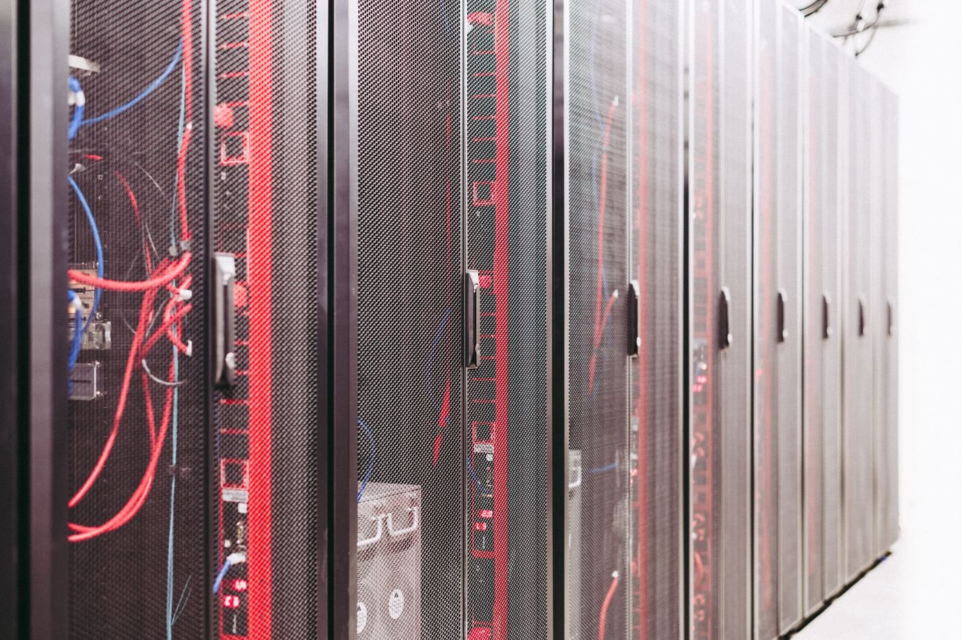 Rows of server racks in a data center used for backup and storage